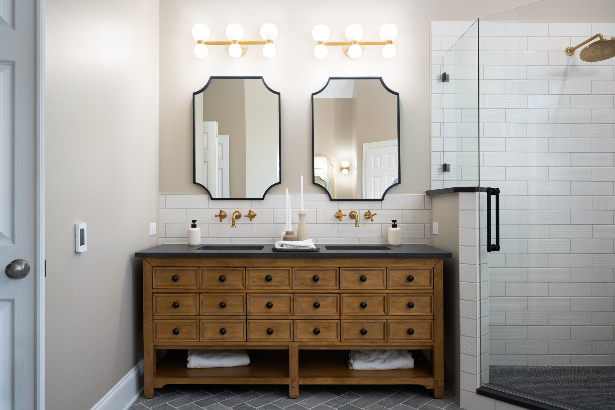 master bathroom storage solutions include furniture-like vanities.